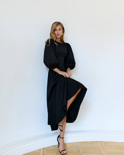 Elegancka rozkloszowana sukienka midi z bufiastymi rękawami zawiązywana na kokardę w kolorze czarnym