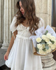 Elegantes schwarzes trägerloses Midikleid mit Rüschenbesatz