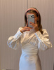 Elegancka sukienka midi z odkrytymi plecami Raja biała 